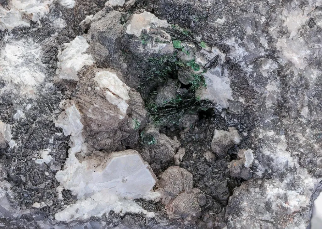 Hydrocerussite with Crednerite and Malachite image