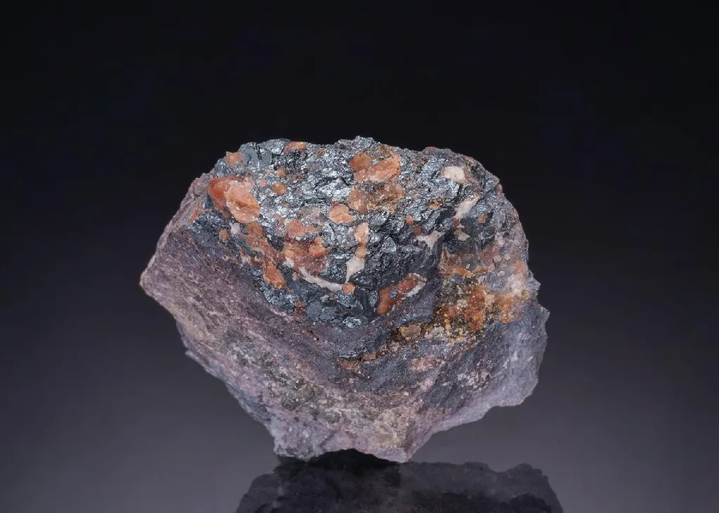 KOLICITE with HOLDENITE and Franklinite image