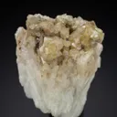 Kosnarite on Albite - image 1