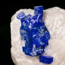 Lazurite (Lapis) ps. Phlogopite on Calcite - image 1