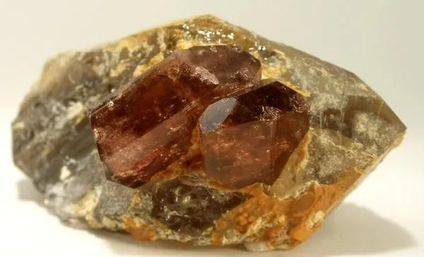 Liddicoatite, Quartz (Var: Smoky Quartz) image