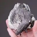 LÖLLINGITE with Arsenopyrite Magnetite and Quartz - image 2