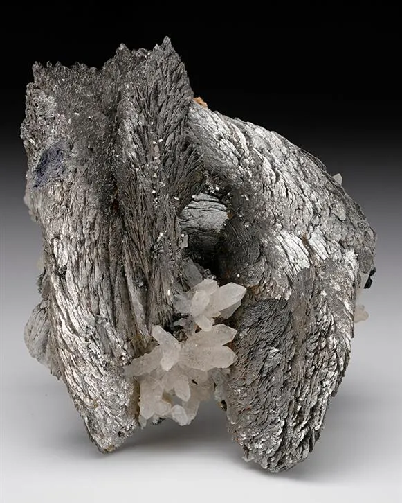 LÖLLINGITE with Arsenopyrite Magnetite and Quartz image