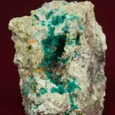 Macquartite (type locality) with Dioptase, and Wulfenite - image 3