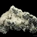 Manganoan Calcite (Fluorescent) on Sphalerite, Pyrite, and Galena - image 2