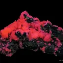 Manganoan Calcite (Fluorescent) on Sphalerite, Pyrite, and Galena - image 1