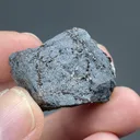 Melanotekite with Phlogopite - image 2