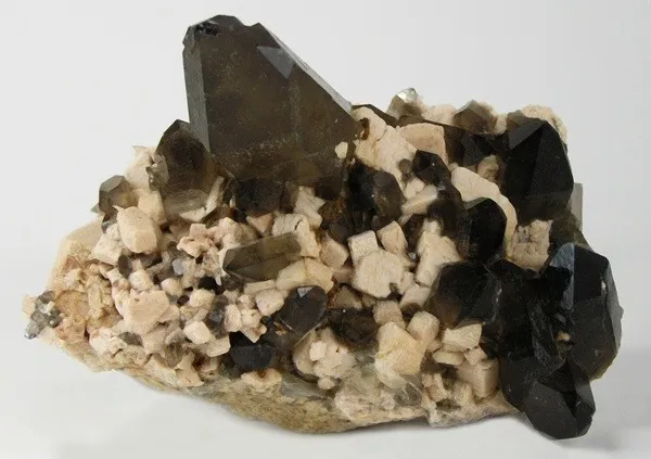 Microcline, Quartz (Var: Smoky Quartz) image