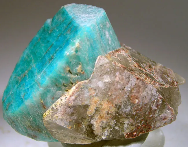 Microcline (Var: Amazonite), Quartz (Var: Smoky Quartz) image