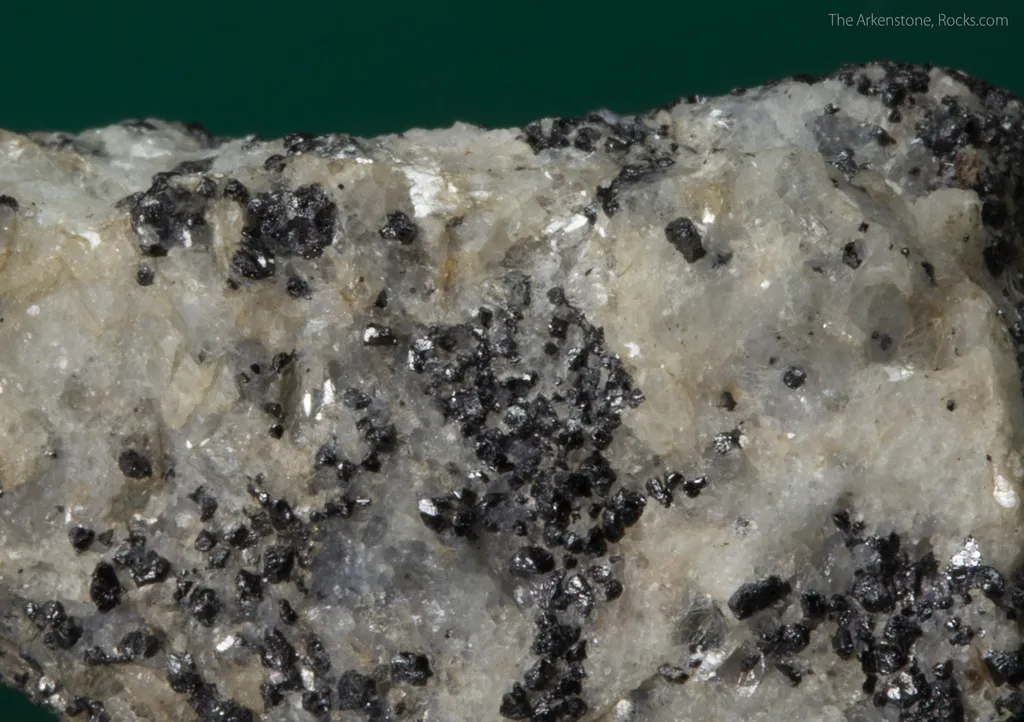Molybdophyllite with Hausmannite on Calcite - image 4