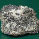 Molybdophyllite with Hausmannite on Calcite - image 2
