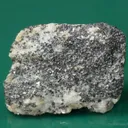 Molybdophyllite with Hausmannite on Calcite - image 3