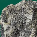 Molybdophyllite with Hausmannite on Calcite - image 5