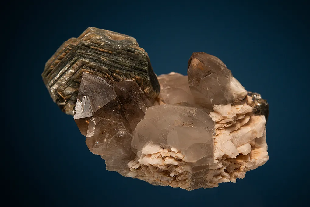 Muscovite on Quartz var. Smoky and Microcline image