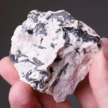 NAGYÁGITE in Rhodochrosite