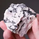 NAGYÁGITE in Rhodochrosite - image 2