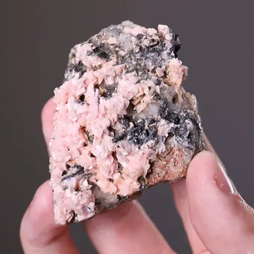 NAGYÁGITE with Rhodochrosite on Quartz