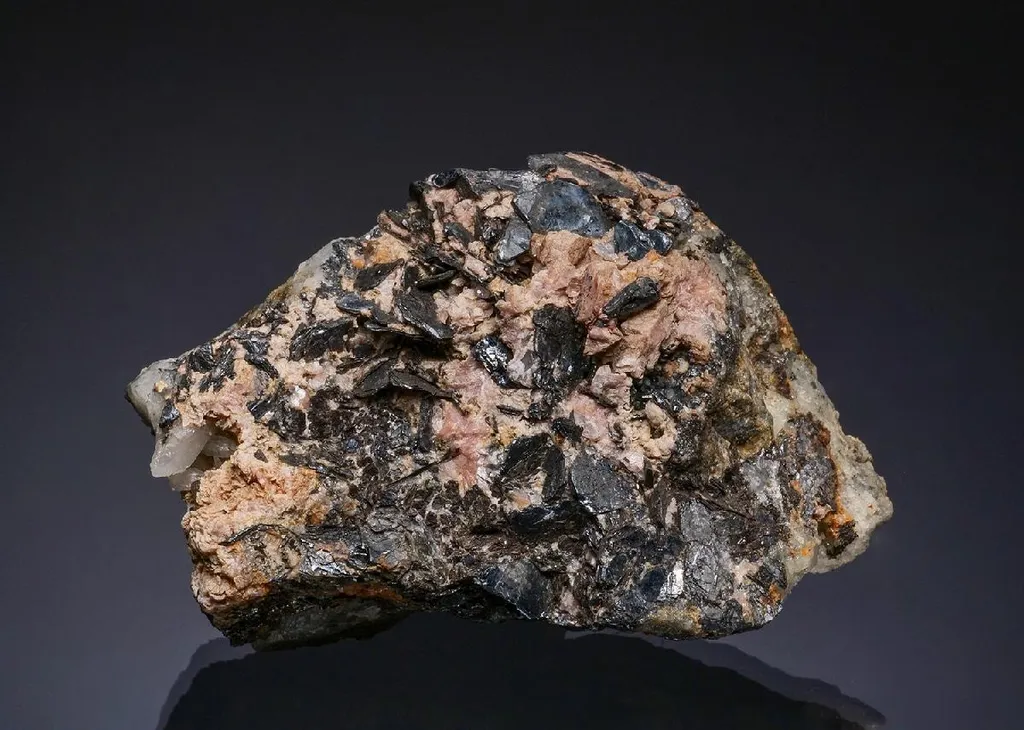 NAGYÁGITE with Rhodochrosite image