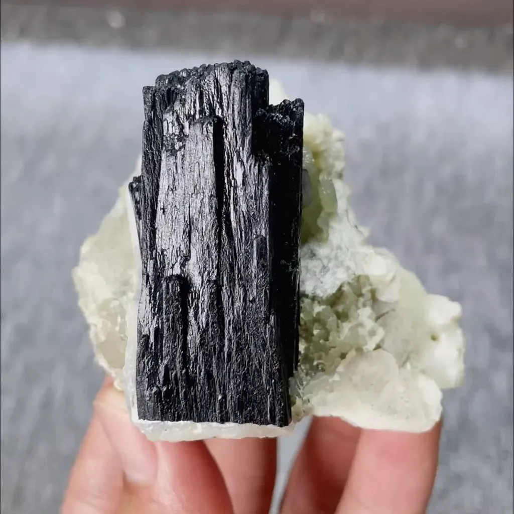 Natural Black Columnar Stone and Quartz Symbiosis comes from Inner Mongolia,China 65*55*55MM image