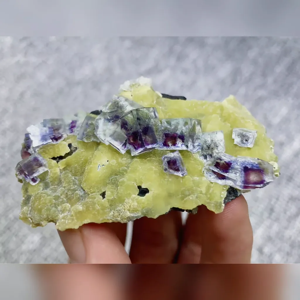 Natural Blue Phantom Fluorite with Mica and Arsenopyrite Symbiosis comes from Yindu,Inner Mongolia 70*40*15MM image