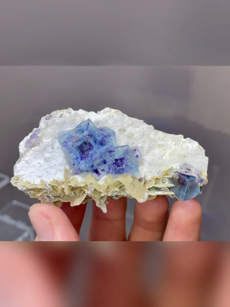 Natural Blue Purple Phantom Fluorite comes from Yindu,Neimenggu 70*40*25MM image