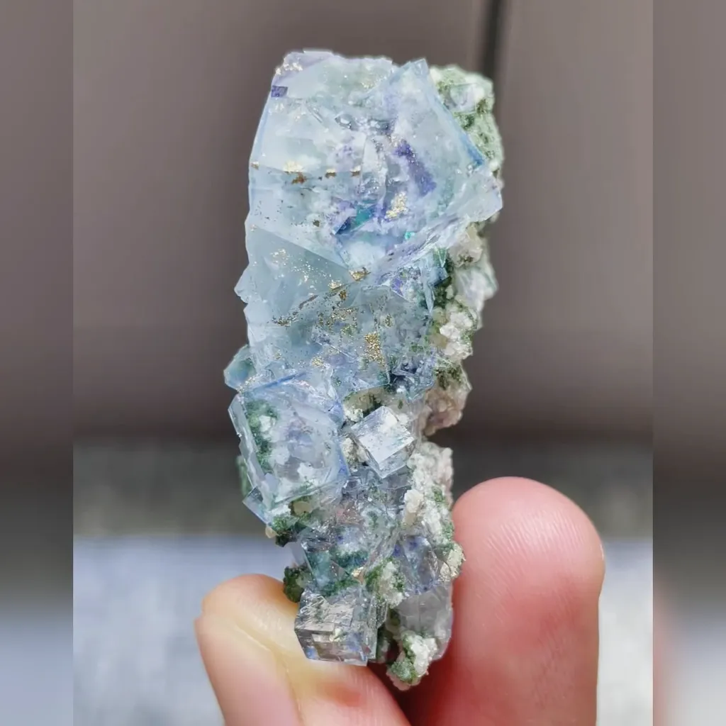 Natural Blue Transparent Cubic Fluorite and Pyrite Symbiosis comes from Yaogangxian,Hunan 20*25*45MM image