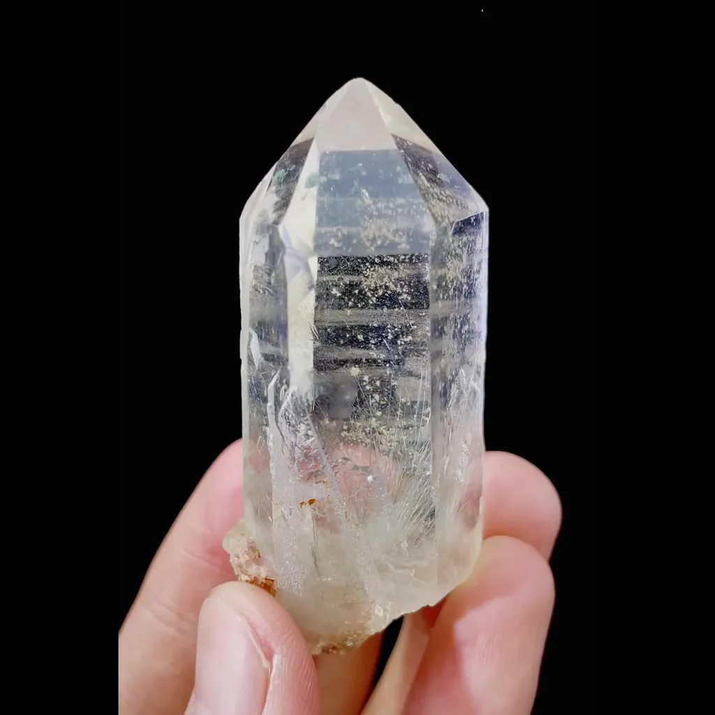 Natural Clear Quartz Tower with Rutilated Quartz comes from Madagascar 25*25*60MM image