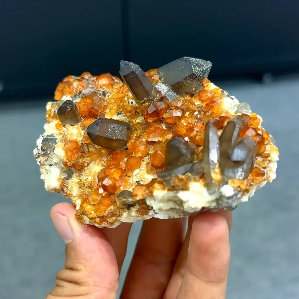 Natural Garnet and Smoky Quartz Tower Symbiosis comes from Fujian,China 90*50*40MM image