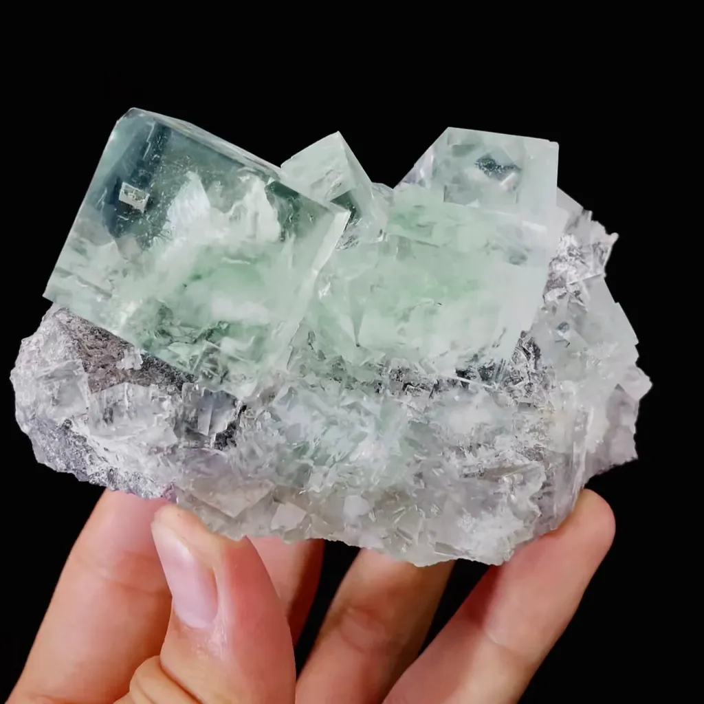 Natural Green Transparent Cubic Fluorite comes from Xianghualing,Hunan 90*50*65MM image