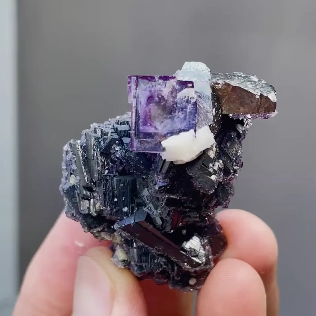 Natural Purple Cubic Fluorite and Arsenopyrite and Wolframite Symbiosis comes from Yaogangxian,China 30*20*50MM image