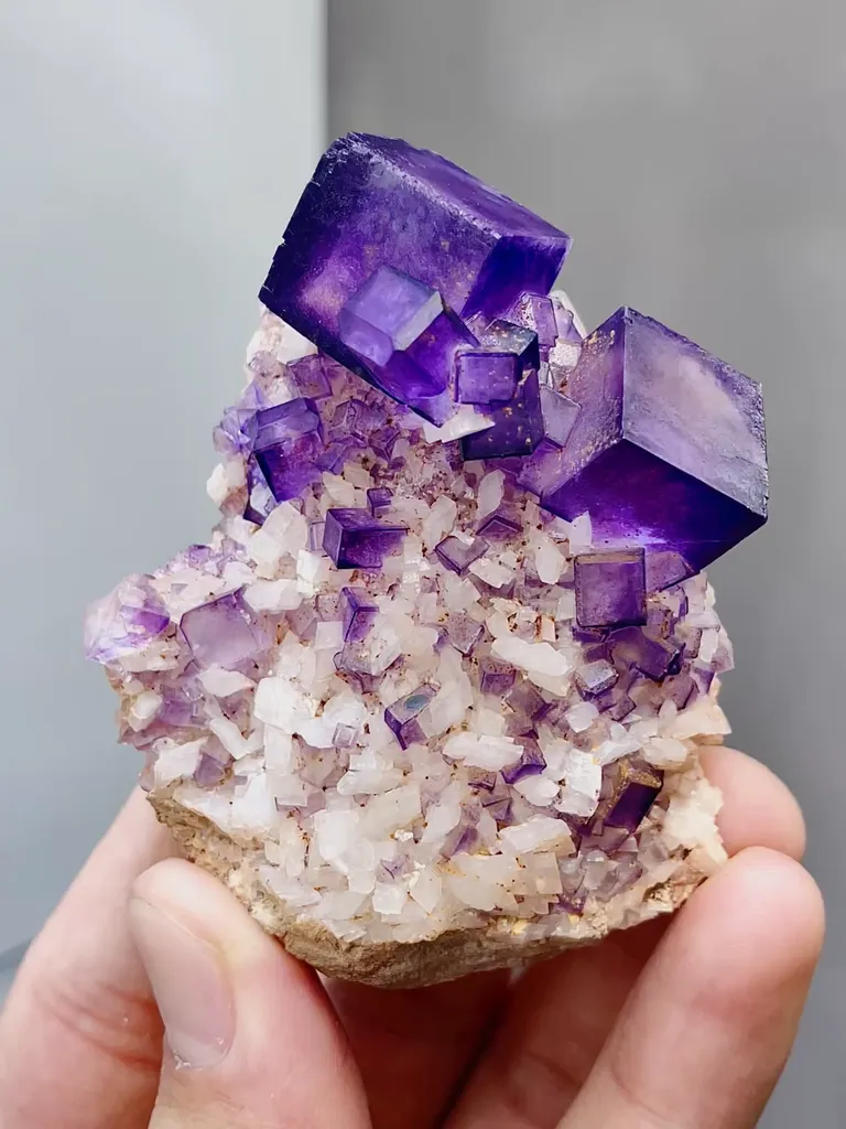 Natural Purple Cubic Fluorite and Dolomite coexist comes from Xinjiang 65*45*35MM image