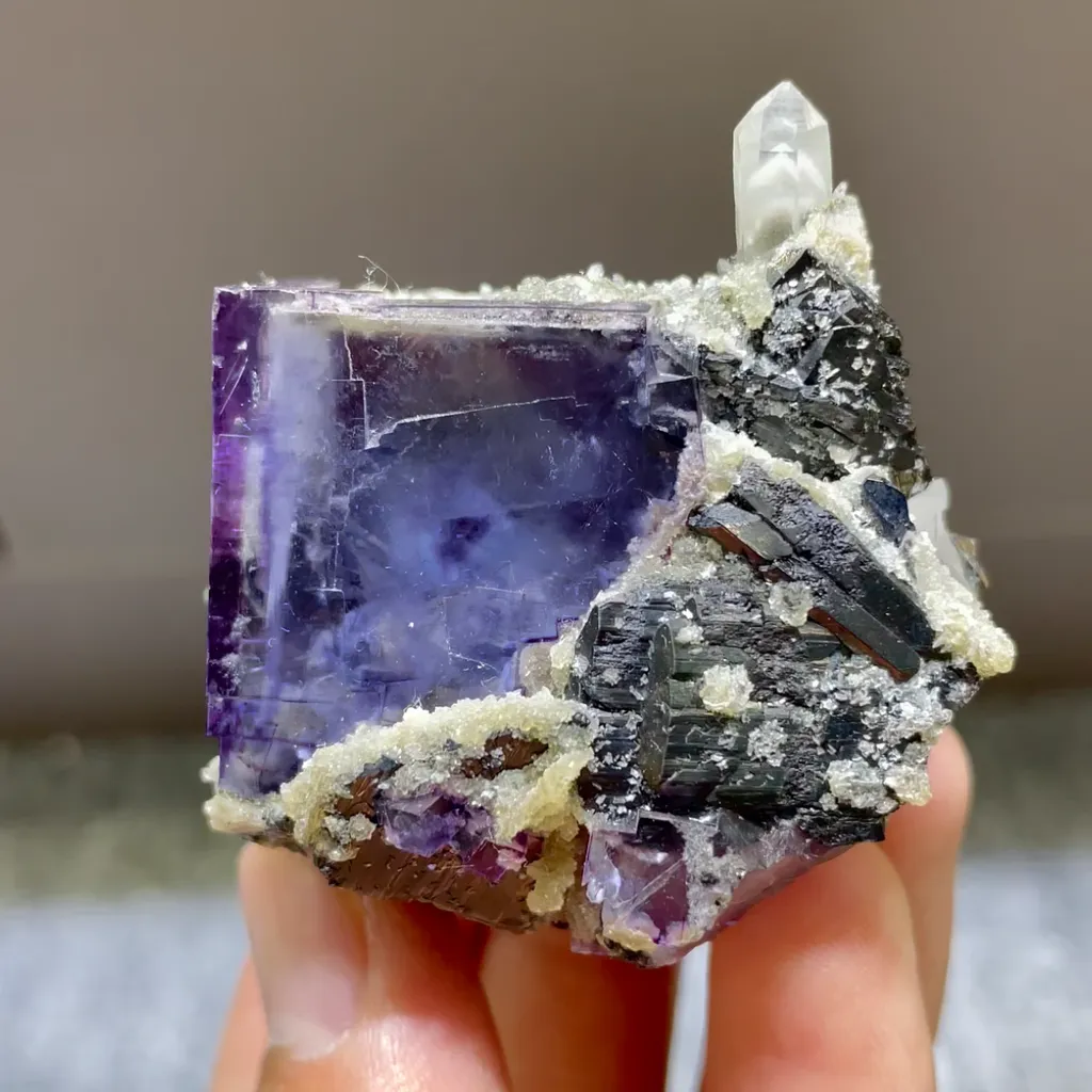 Natural Purple Cubic Fluorite with Quartz and Hessianite Symbiosis comes from Yaogangxian,Hunan 40*50*50MM image