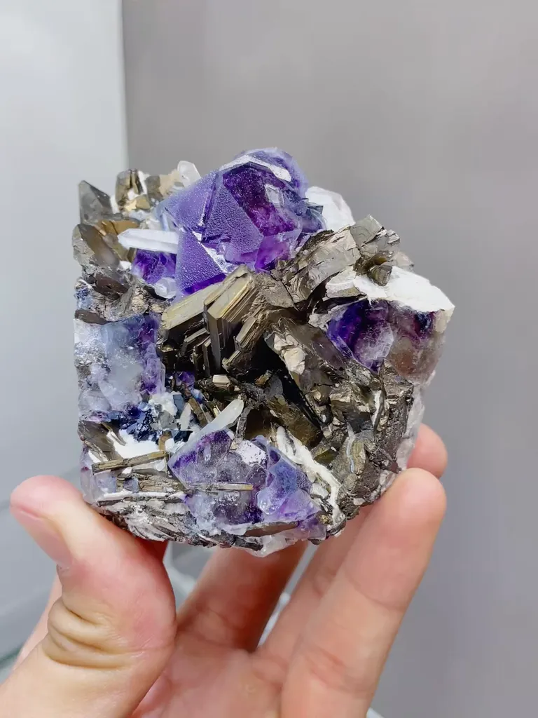 Natural Purple Fluorite coexists with Magnetite comes from Yindu,Inner Mongolia 75*50*60MM image