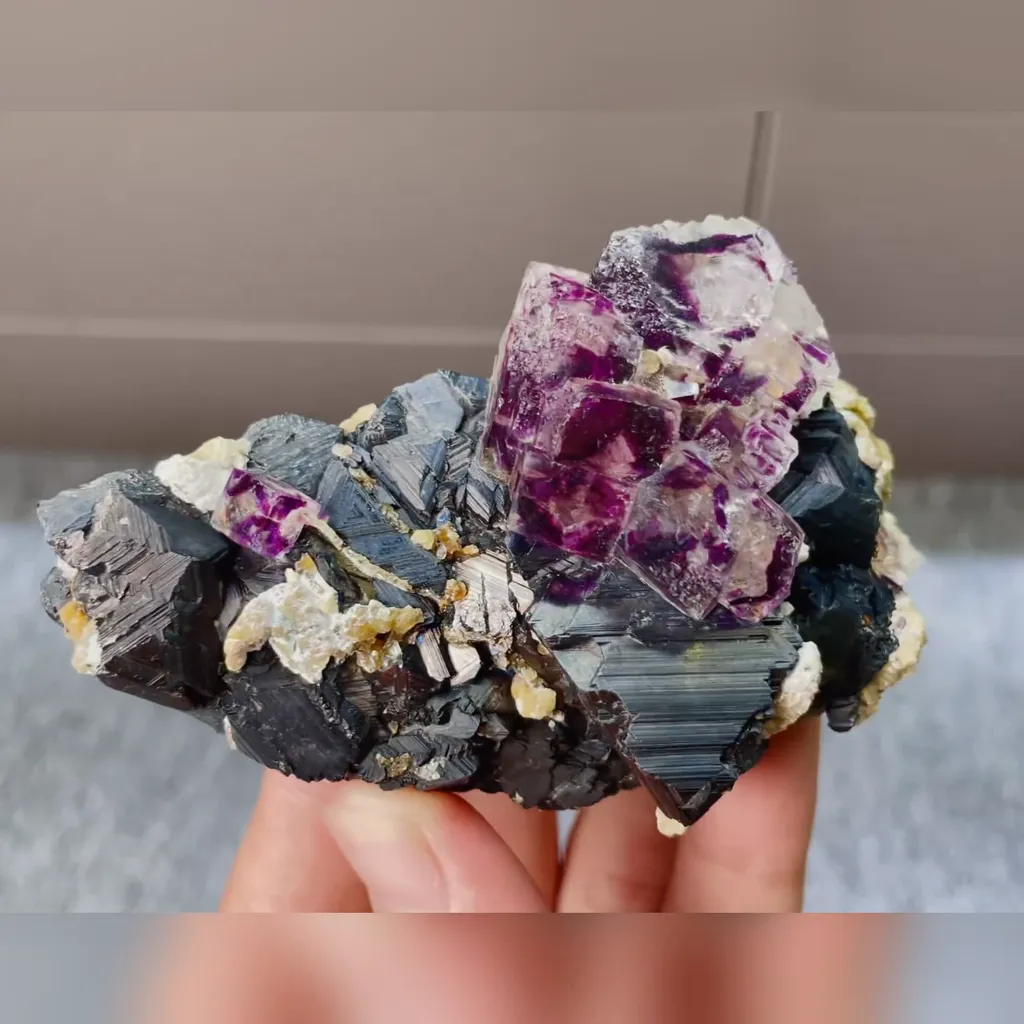 Natural Purple Phantom Fluorite and Black Wolframite comes from Yaogangxian,Hunan 85*55*30MM image