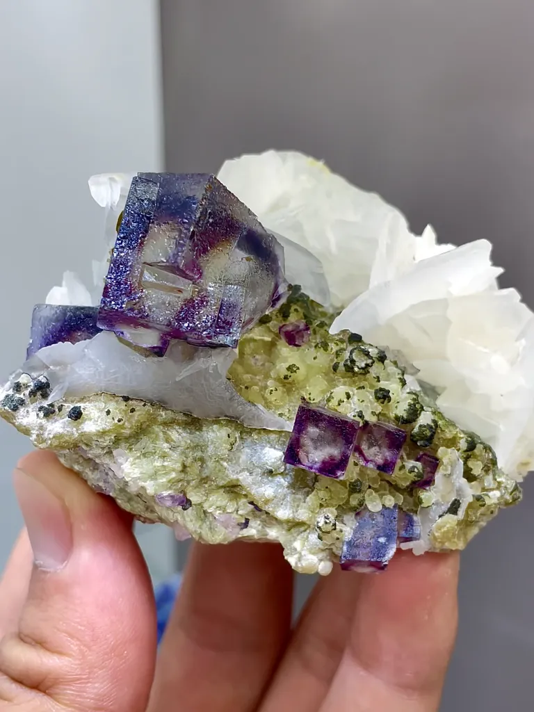 Natural Purple Phantom Fluorite Coexists with Flake Calcite and Mica comes from Neimenggu,China 70*60*45MM image