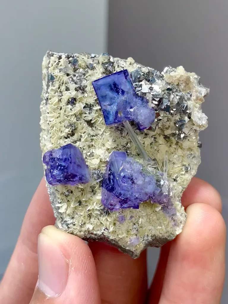 Natural Purple Phantom Fluorite coexists with Pyrite and Flaky Calcite comes from Yaogangxian,Hunan 45*30*25MM image