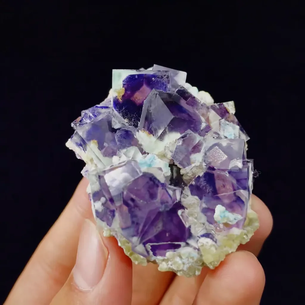 Natural Purple Phantom Fluorite comes from Yindu,Inner Mongolia 40*50*20MM image