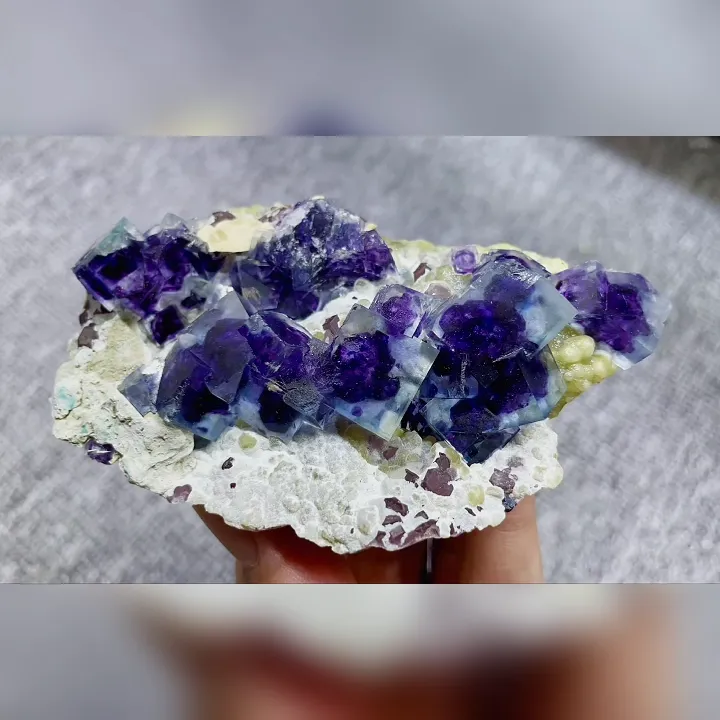 Natural Purple Phantom Fluorite comes from Yindu,Inner Mongolia 95*60*30MM image