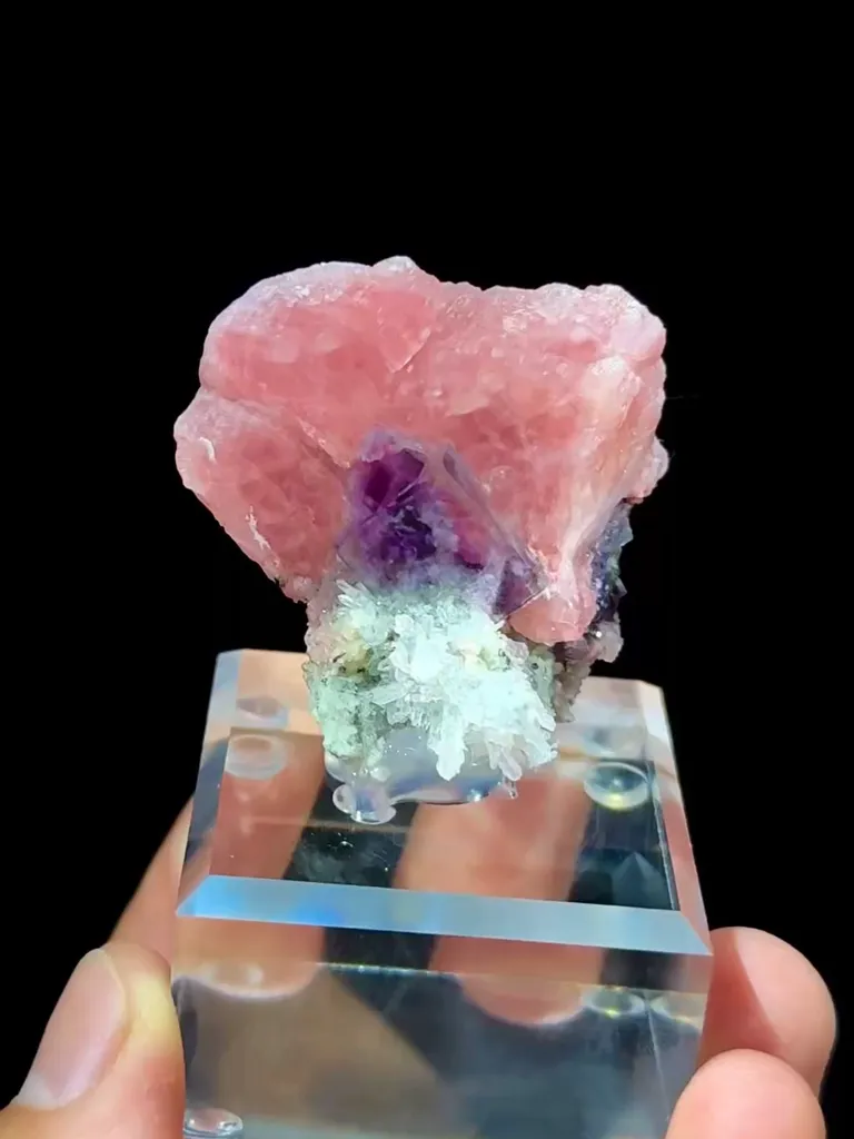 Natural Rhodochrosite coexists with Purple Phantom Fluorite and Quartz comes from Guangxi,China 40*25*35MM image