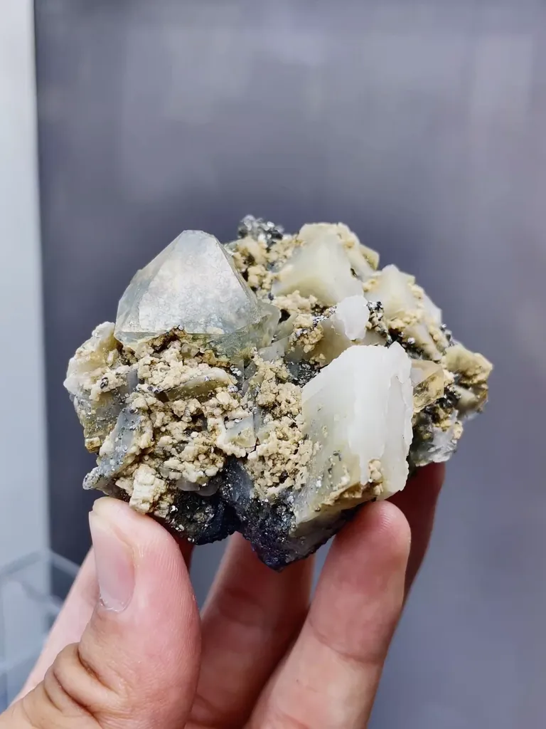 Natural Transparent Fluorite and Calcite coexist comes from Huanggangliang,Inner Mongolia 70*35*60MM image