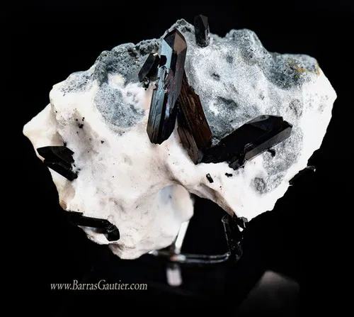Neptunite on Natrolite image