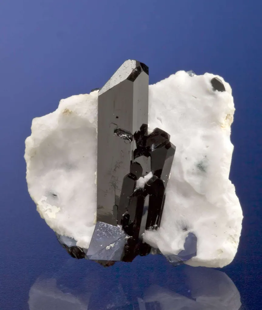 Neptunite on Natrolite image