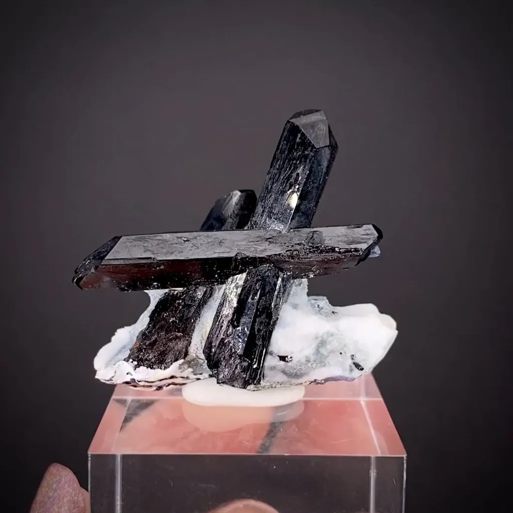 Neptunite on Natrolite with Benitoite image