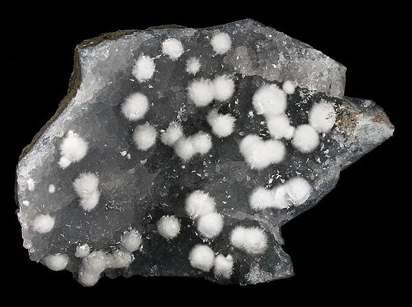 Okenite, Quartz image