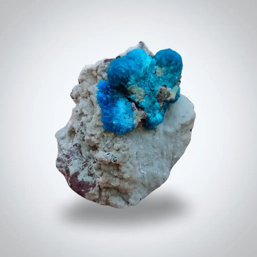 Pentagonite and Cavansite together. on  matrix image