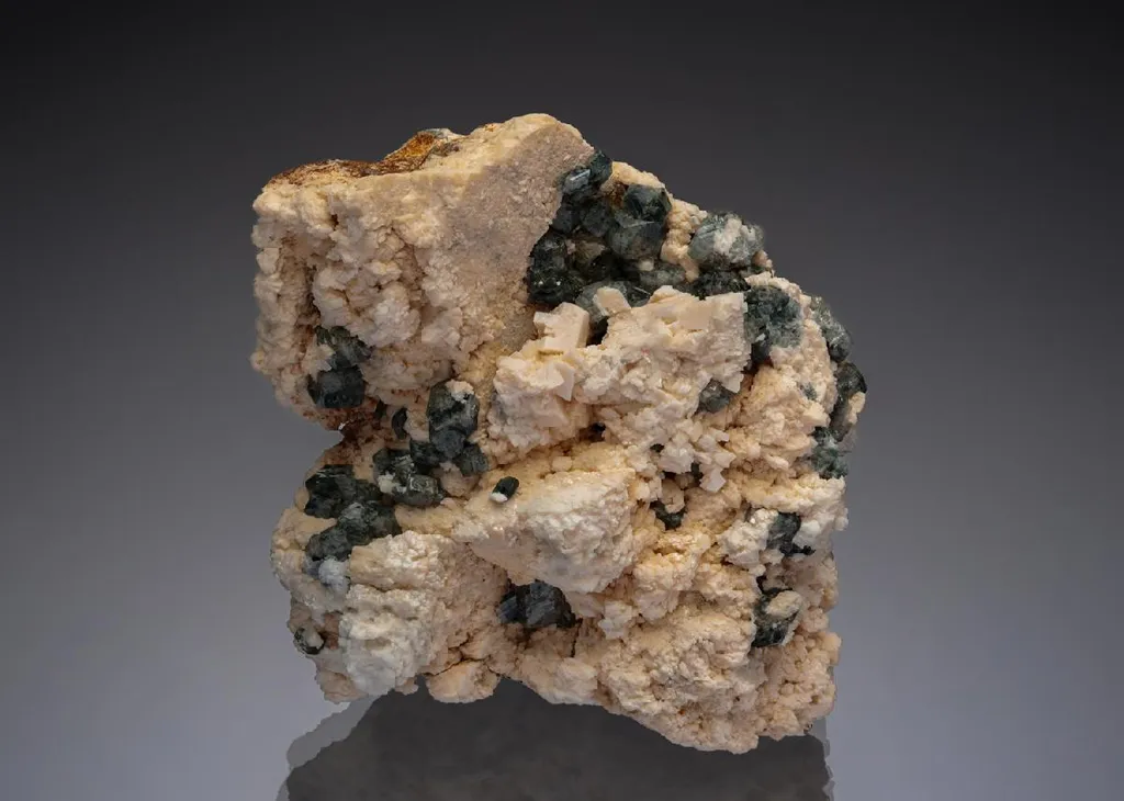 Phenakite on Orthoclase image