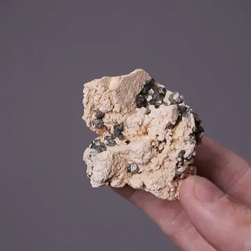 Phenakite on Orthoclase