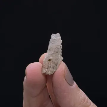 Phenakite on Quartz