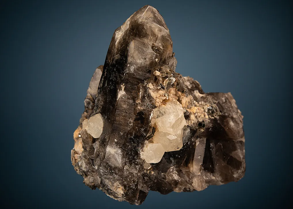 Phenakite on Quartz var. Smoky image