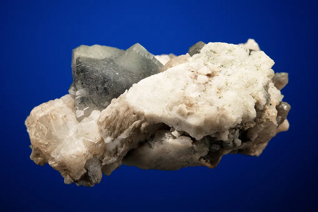Phenakite on Quartz var. Smoky and Calcite - image 4